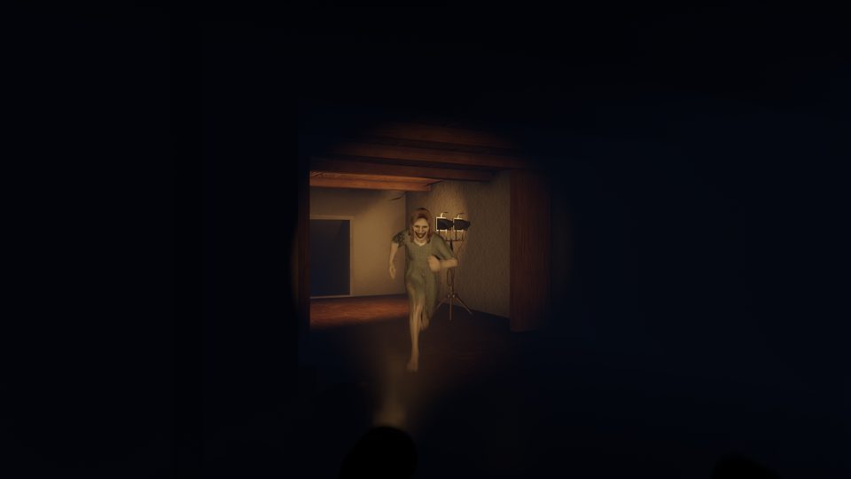 Torchlight on a doorway in a dark room.